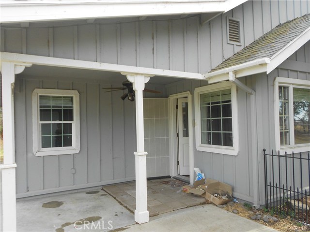 Back door and porch to enjoy the day and evenings from.