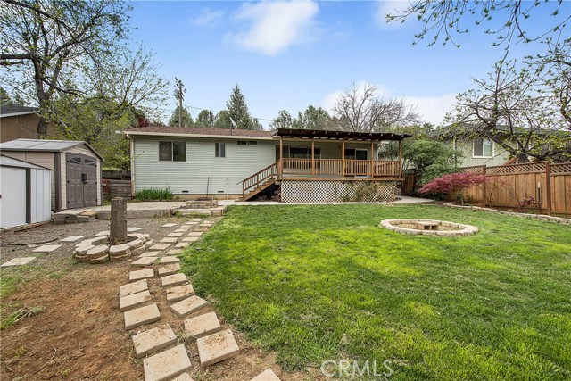 Backyard includes two storage sheds