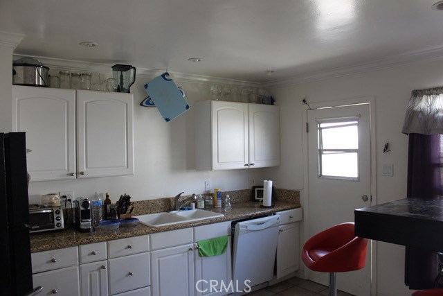 Kitchen with newer cabinets and granite