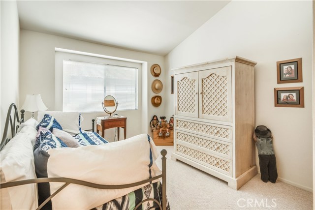 2nd upstairs bedroom. Very good size, and nice vaulted open ceilings.