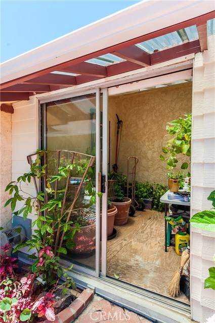 Greenhouse or workshop off rear patio. Could also be an artists studio or a kids playhouse!