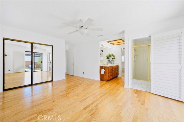 Sun-drenched Primary Bedroom with Ensuite & Gigantic Walk-In Closet.