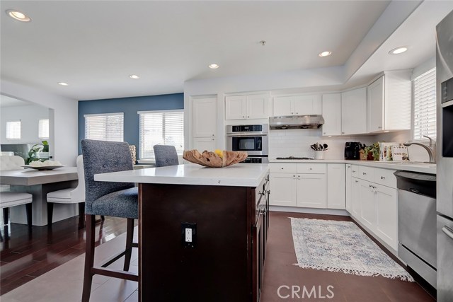 Tile floors, shakers cabinets and subway tile backsplash make this kitchen stand out from the rest.