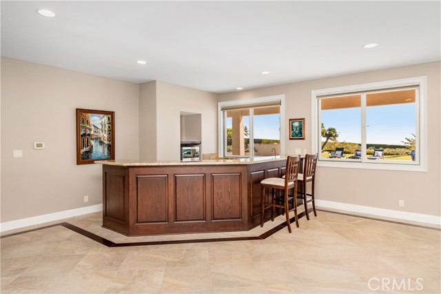 Lower level bar with pool and ocean view