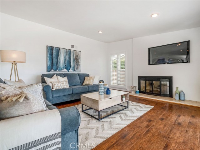 Living Room with view of gas fireplace and wall big enough to mount a t.v.