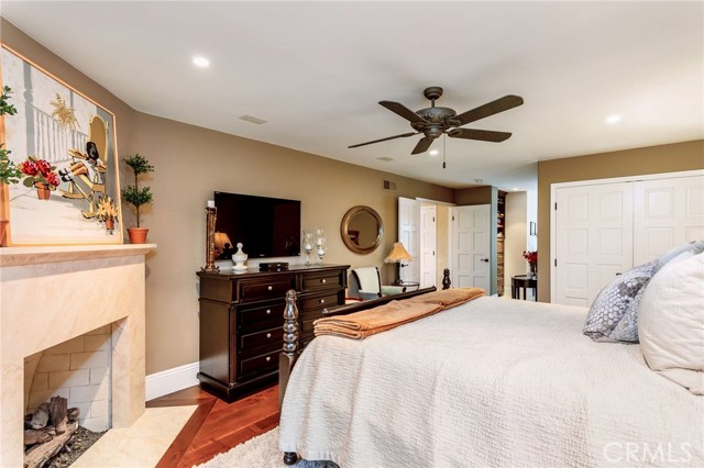 View of the master bedroom w/fireplace.