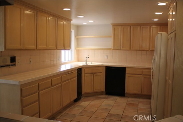 kitchen, actually much lighter cabinetry than this picture shows.  Tons of storage, very spacious.