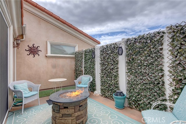 Oversized private balcony off the living room.  Perfect for outdoor time, al-fresco dining, and entertaining!