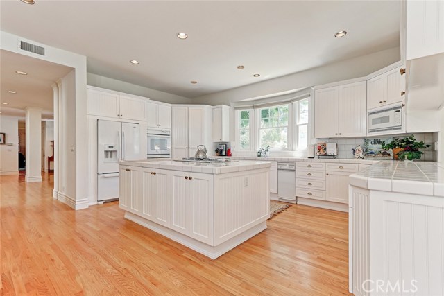 Gourmet chef's kitchen with expansive counter space for cooking and entertaining.