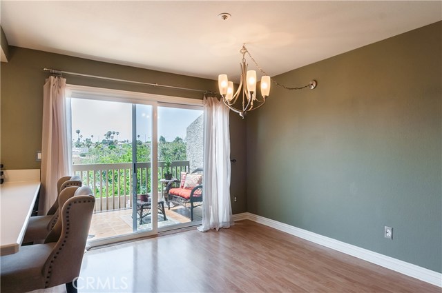 Dining Area with sliders to patio.  This could be set up as a family room, office, etc...