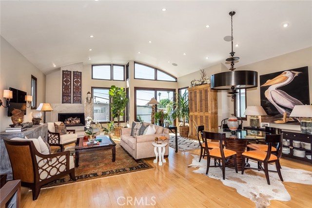 Stunning great room with 12' domed ceilings, fireplace and amazing natural light.