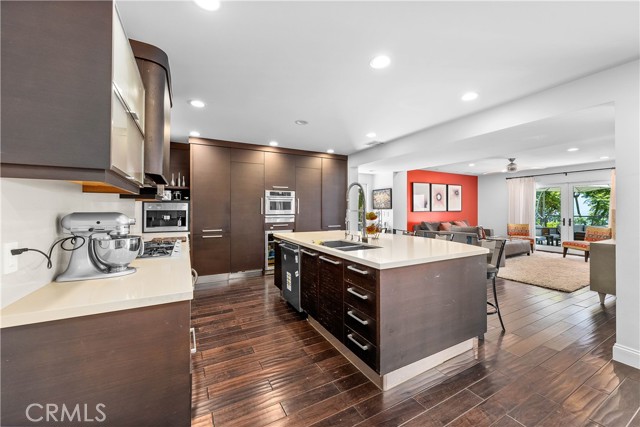 Another kitchen shot with the family room in the background.