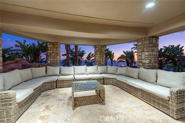 Covered patio in the backyard. Add family and friends and you've got yourself a party with amazing ocean views and stunning sunsets!