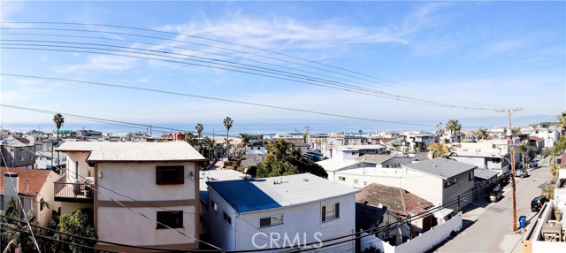 Unblock-able sweeping Southern ocean views all the way to Santa Monica Mountains, Malibu and Point Dume taken from roof to show approximate future view potential.