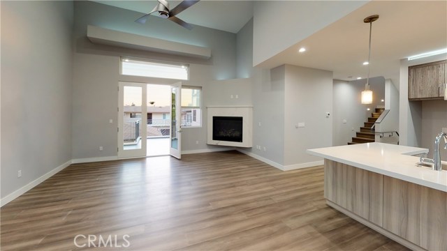 ALTERNATIVE VIEW OF LIVING ROOM FROM DINING AREA