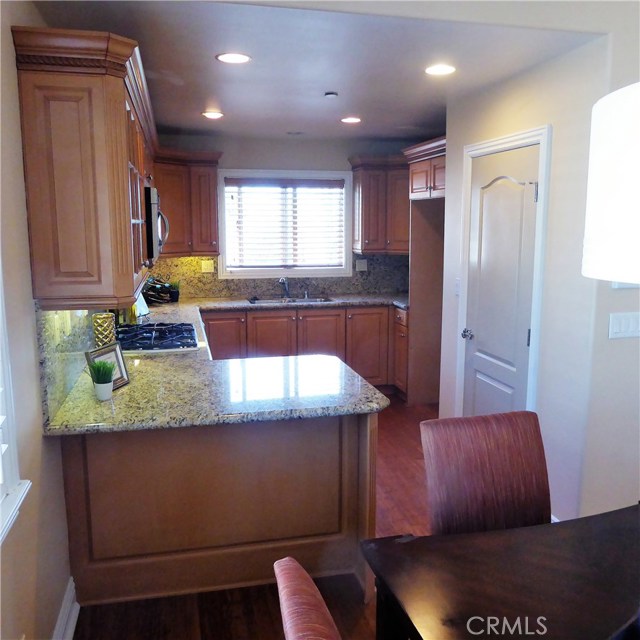 Beautiful kitchen with granite tops and pantry