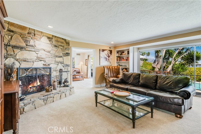 Living Room with custom stone fireplace