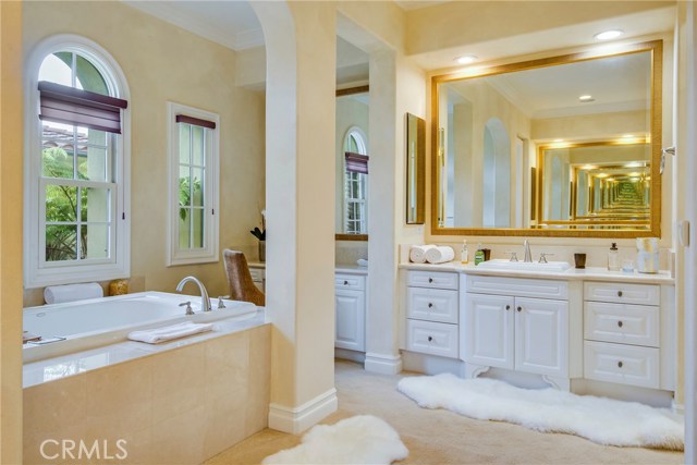 His and Her sinks, plus a vanity for beautification.