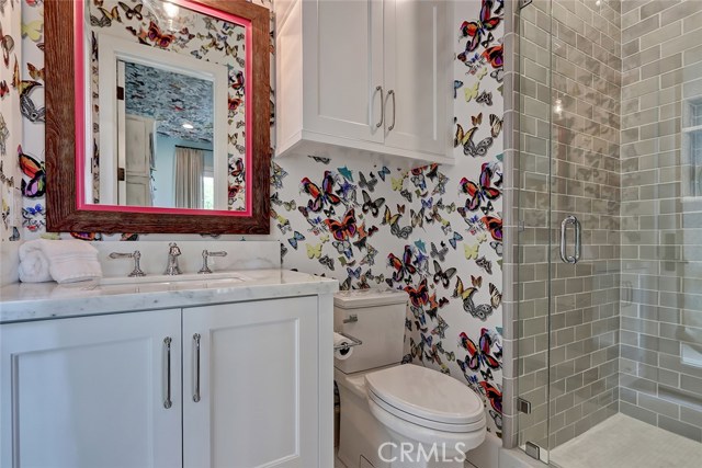 Ensuite bath adjacent to entry level bedroom