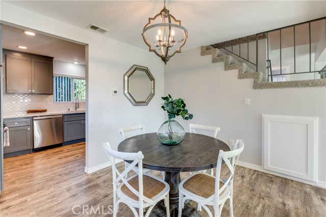 The dining room flows seamlessly into the kitchen