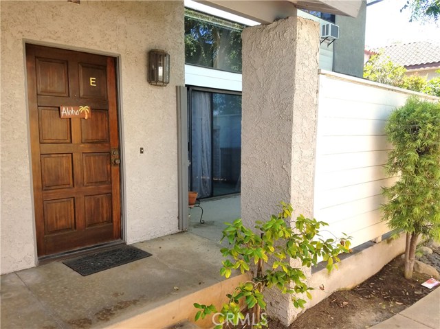 Welcome Home! Front Door & a peek into patio.