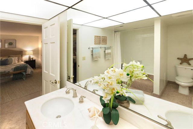 Master Bathroom w/double sinks and tub shower.