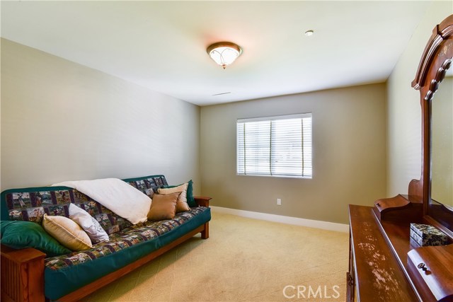 Main level bedroom. Would also make a great office.
