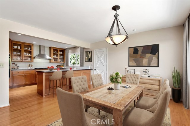 Nice flow from the formal dining to the well laid out kitchen, the living room and sideyard via the dutch doors.