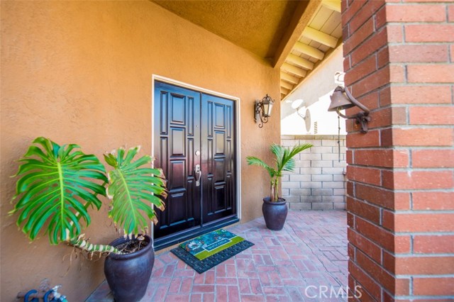 Double door entry with patio space.