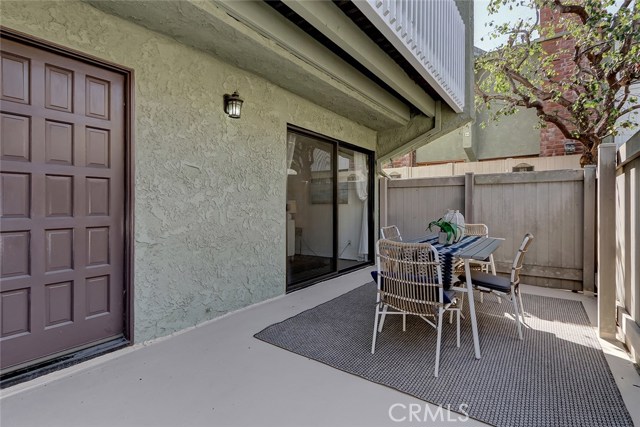 Outdoor living space just off the living room makes for easy outdoor living and dining! Completely private!