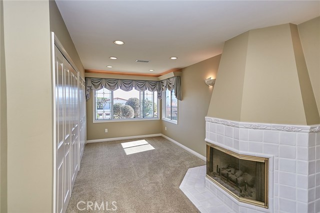 Fireplace in master with views of the city