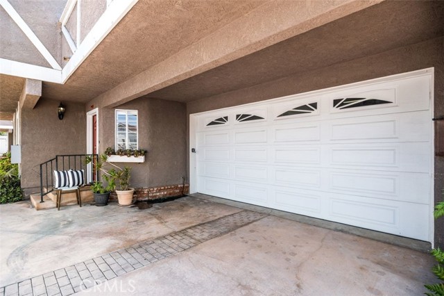 extra wide driveway allows parking apron in front of garage