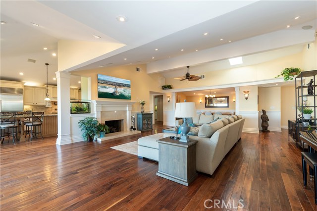 Another living room view, looking toward the open kitchen.