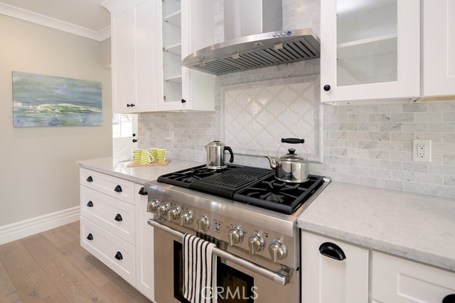 Beautiful white cabinets and marble counter tops