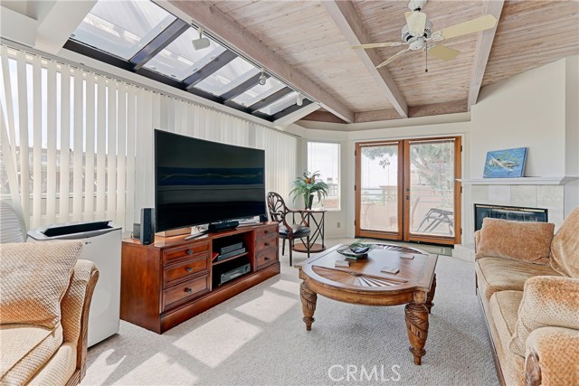 Back Unit- Living room with balcony access and fireplace