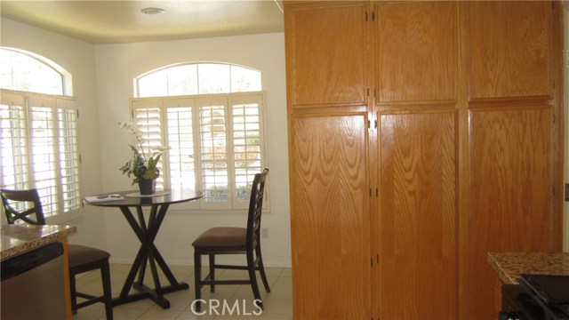 LOTS OF PANTRY/CABINET STORATE AND COZY KITCHENETTE AREA