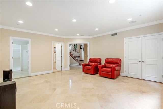 Downstairs ensuite bedroom with two closets.