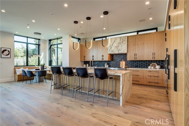 Kitchen opens to great room and back yard