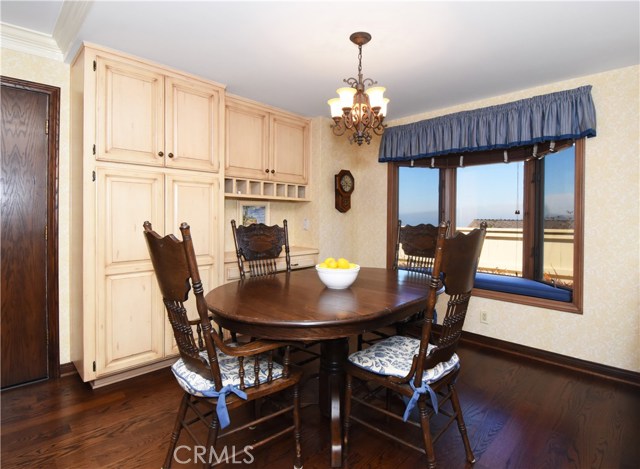 Eat in kitchen with built in storage and desk area. Bay window with amazing views.