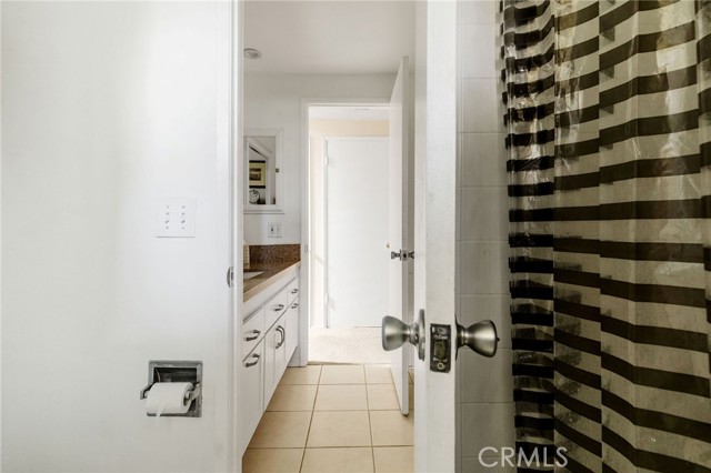 Upstairs bathroom has 2 vanities. Looking towards hallway side of bathroom.