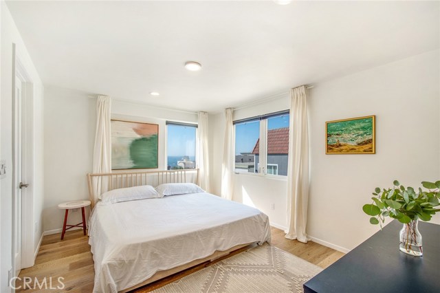 2nd level master bedroom with walk in closet and private en suite bath.
