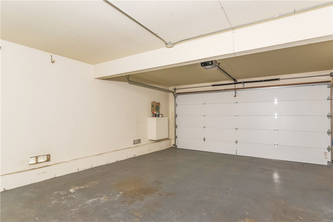 The garage is wide and deep allowing for good storage areas and there are laundry hookups right by the garage entry into the house