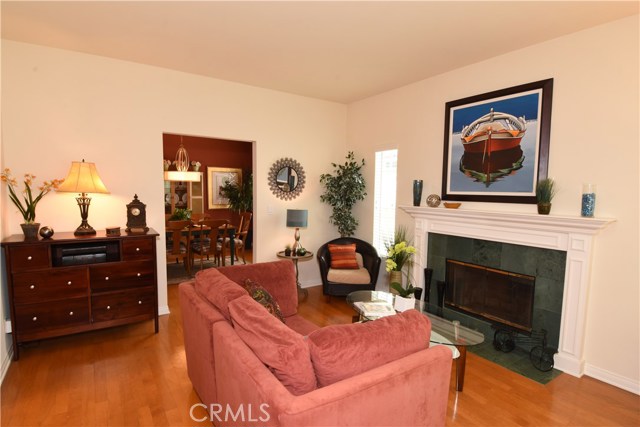 Beautiful formal living room with formal dining room beyond (can also access the dining room from the hallway)