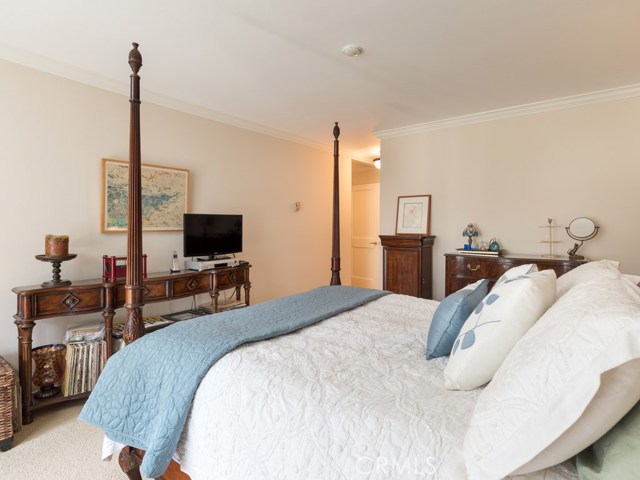 Another view of the master bedroom holding - easily! - many furniture pieces.  There is a large walk-in closet on other side of wall visible in this photo.