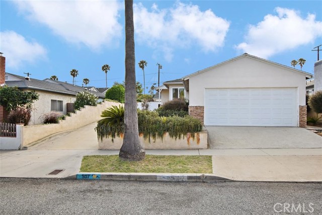 Blossom Lane has two separate driveways for the two structures.