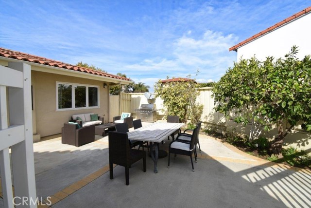 Enclosed Patio in the Back with BBQ Area