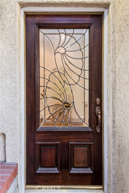 Sorry but this door is an heirloom and will no be included in sales price. Door in garage will be installed and painted at buyer's request.