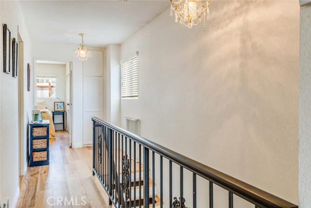 Upper hallway. Gorgeous new hardwood floors on upper level!!