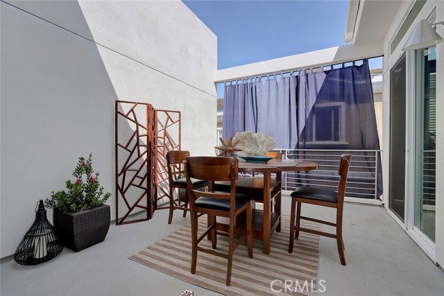 Large 2nd floor balcony adjacent to the living/dining room is ideal for al fresco dining.