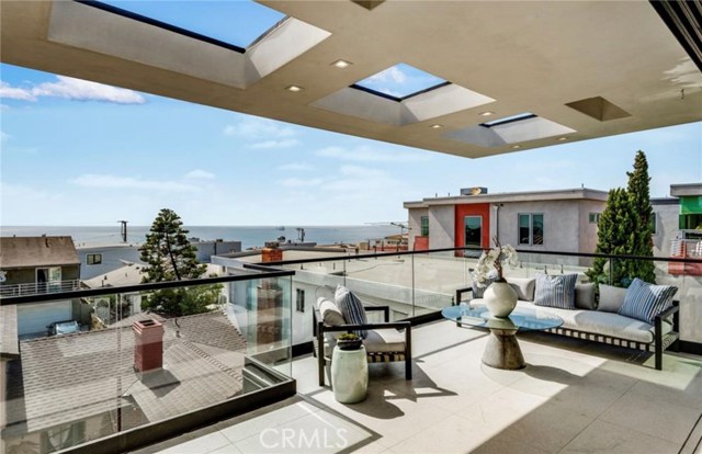 On the top floor, the expansive main terrace includes and unblockable ocean view